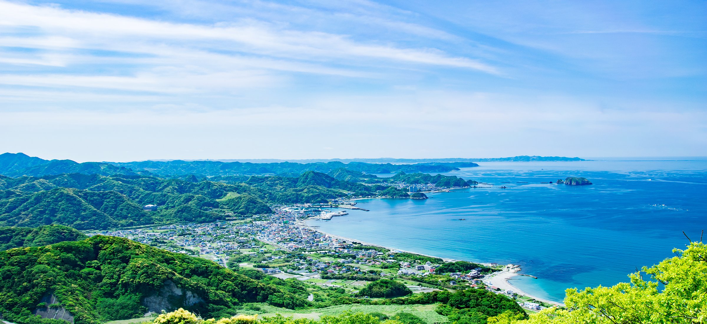 The Boso coastline seen from above, sea and green hills