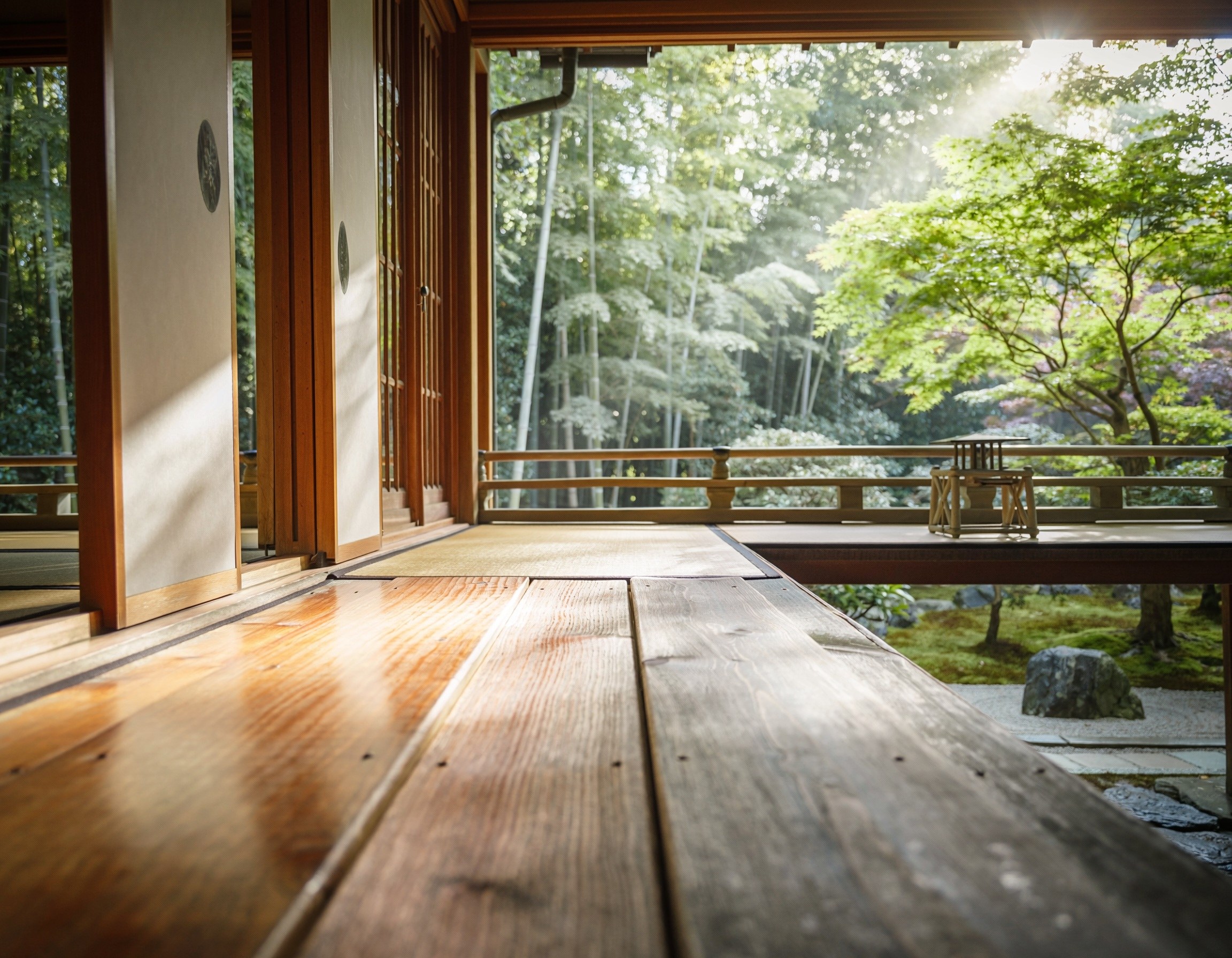 Morning light on the engawa of a Japanese house, garden beyond